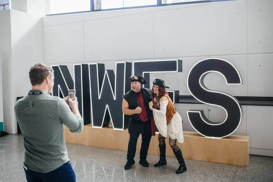 attendees posing for photo 
