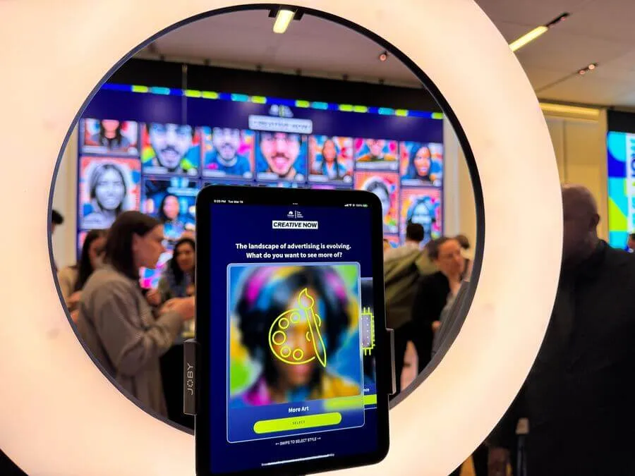 ipad on a ring light stand with snapbar's ai photo booth