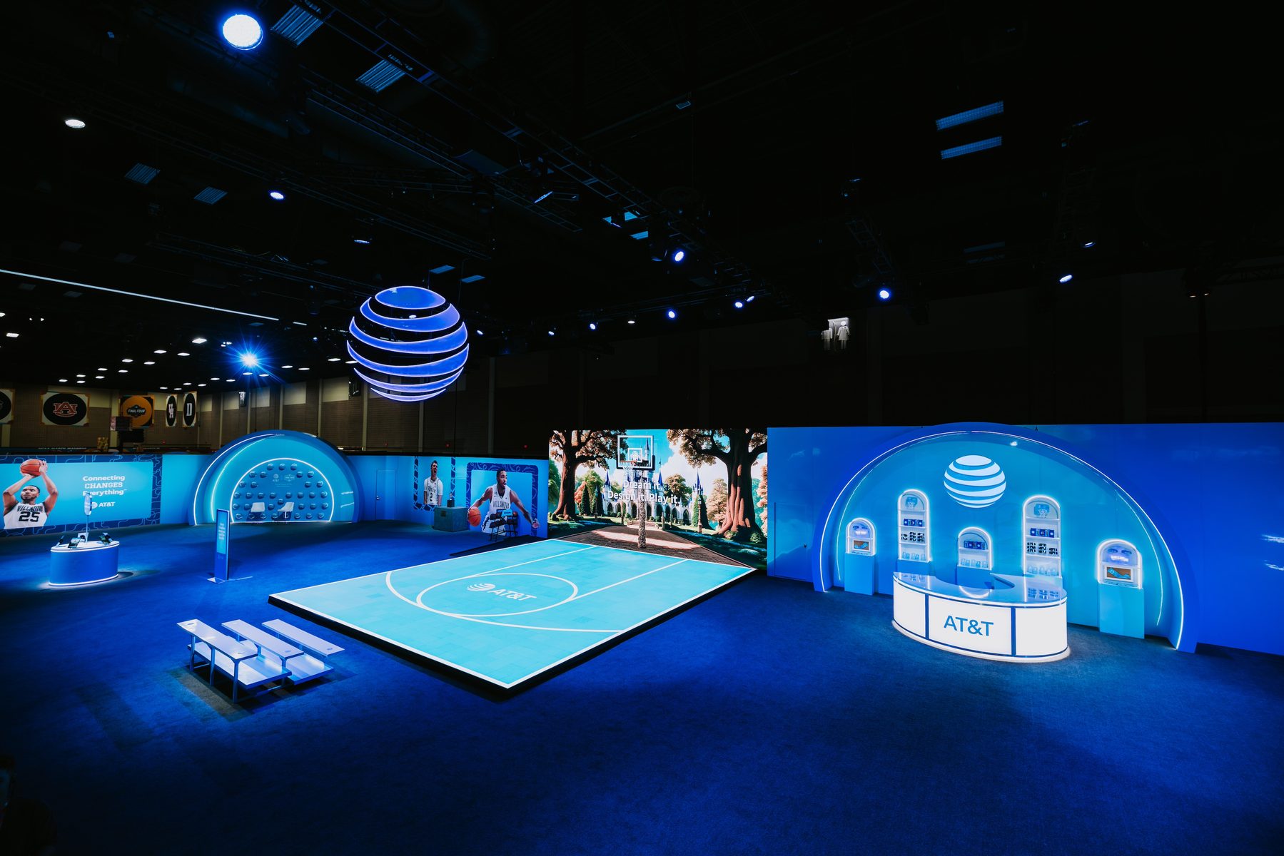 AT&T Fan Zone at the 2025 Final Four Fan Fest featuring a full-size LED basketball court with interactive games and branded environment
