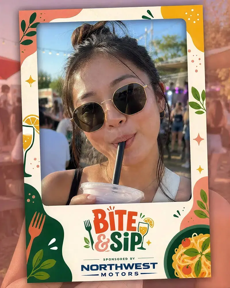 Photo booth snapshot of a guest sipping a drink in a Bite and Sip festival frame sponsored by Northwest Motors