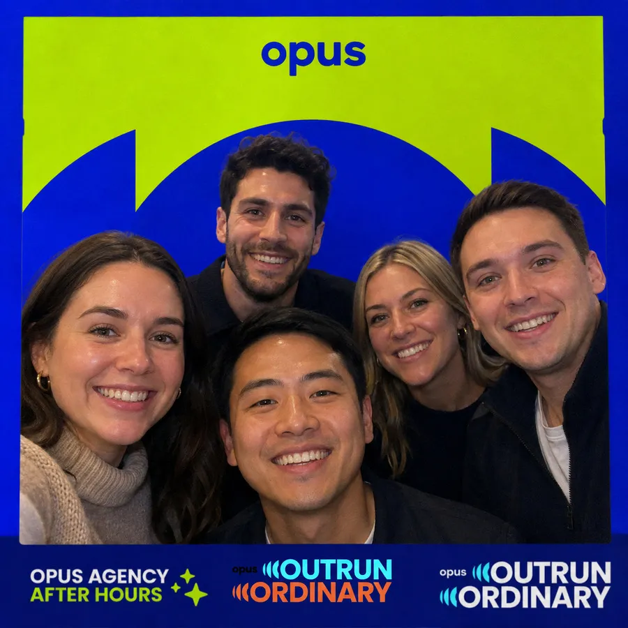 Photo booth snapshot of five teammates on an Opus Agency After Hours Outrun Ordinary frame